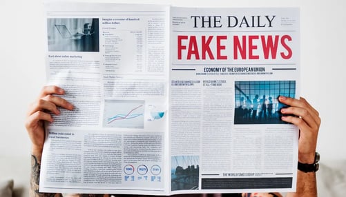 Fake News Displayed over a Newspaper 