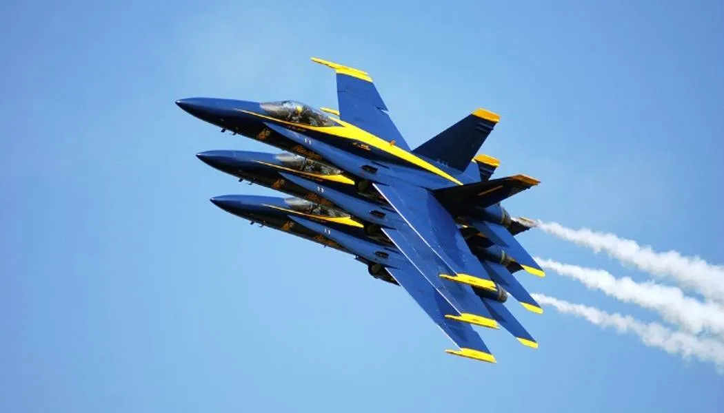 Three fighter jets in the air